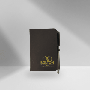 Jot down your thoughts, notes, or inspirations on the go with this compact Bolton Empowerment Foundation mini journal. Includes a matching pen so you're always ready to write. Your purchase makes an impact. Every item from our store helps fund mentorship, education, and wellness programs for youth in foster care and individuals facing breast cancer.